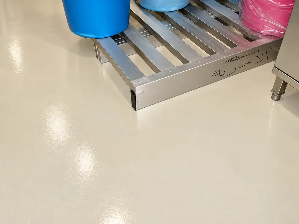Light beige floor around equipment/pallet area